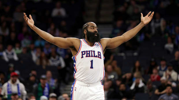 Philadelphia 76ers guard James Harden (1) reacts after scoring a basket against the Minnesota Timberwolves during the second half of an NBA basketball game Friday, Feb. 25, 2022, in Minneapolis.